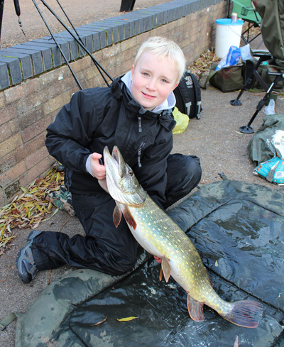 Adam with his new PB pike of 7lb