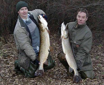 Myself and Tony Lovell with a brace of Boxing Day pike from a session some five years' ago