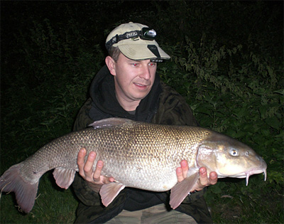 Justin Beale pictured with a 15lb 10oz Thames barbel