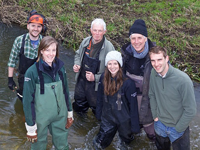   A happy band of habitat volunteers working under the guidance of Andy Thomas from the Wild Trout Trust