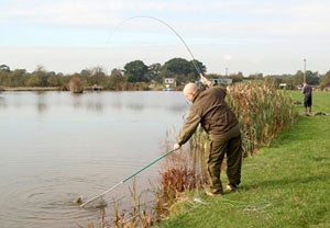 Paul lands his first fish