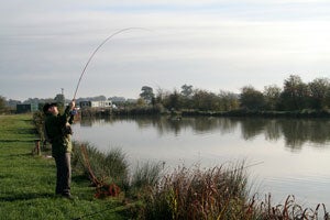 Adrian playing a fish