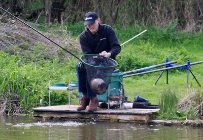 Landing a decent bream on long rod and centrepin