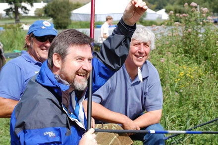 Barry Gardiner MP,  Martin Salter MP and local instructor Dave Phillips fishing at Beale Park Lake