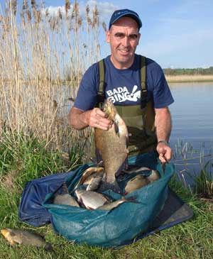 Stuart Holmes (Tight Lines Shaw) with his biggest fish of the week and part the 82lb he had on the last day